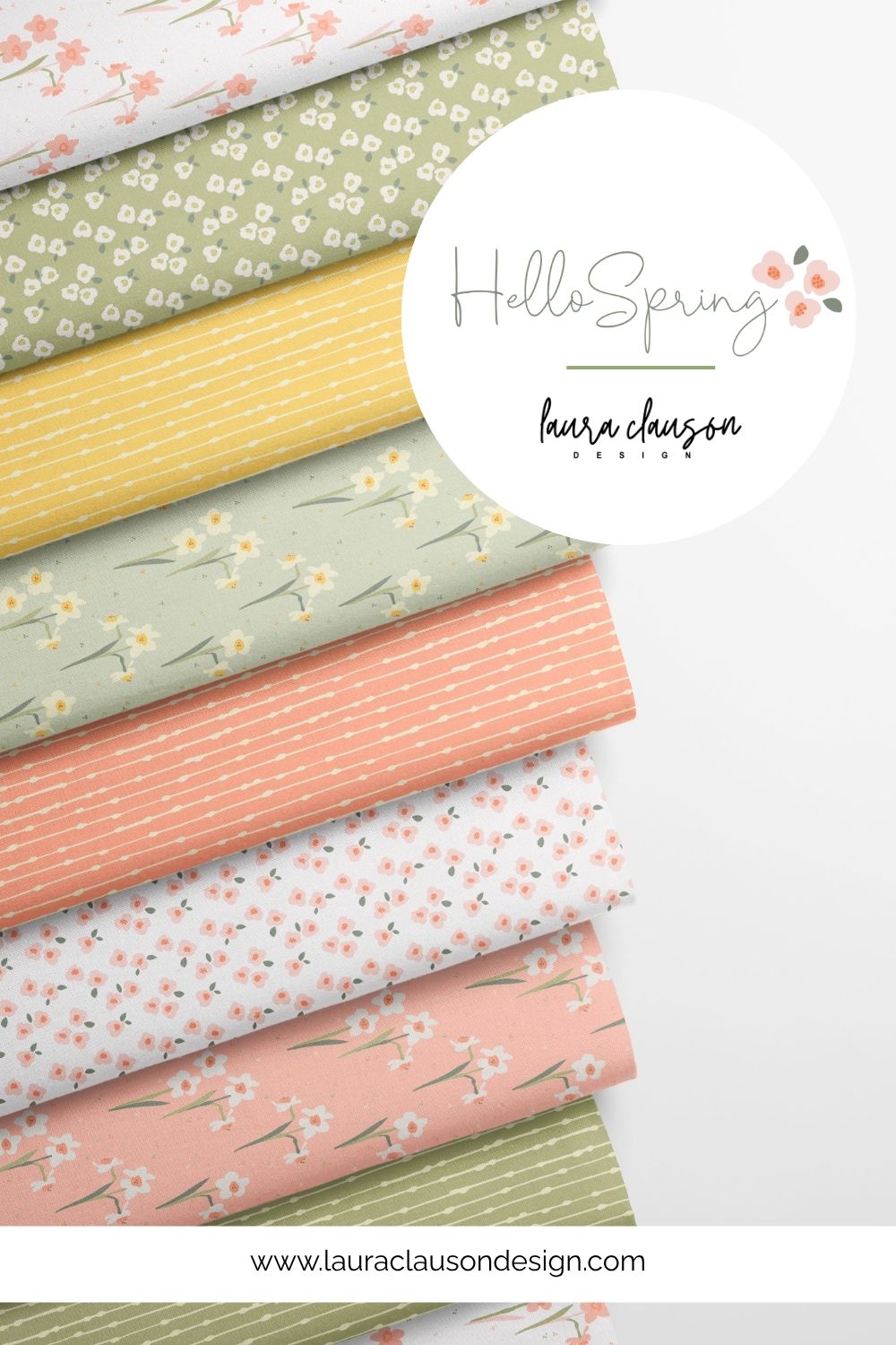 Stack of fabric swatches with floral patterns and a 'Hello Spring' label, featuring Laura Clauson Design branding.